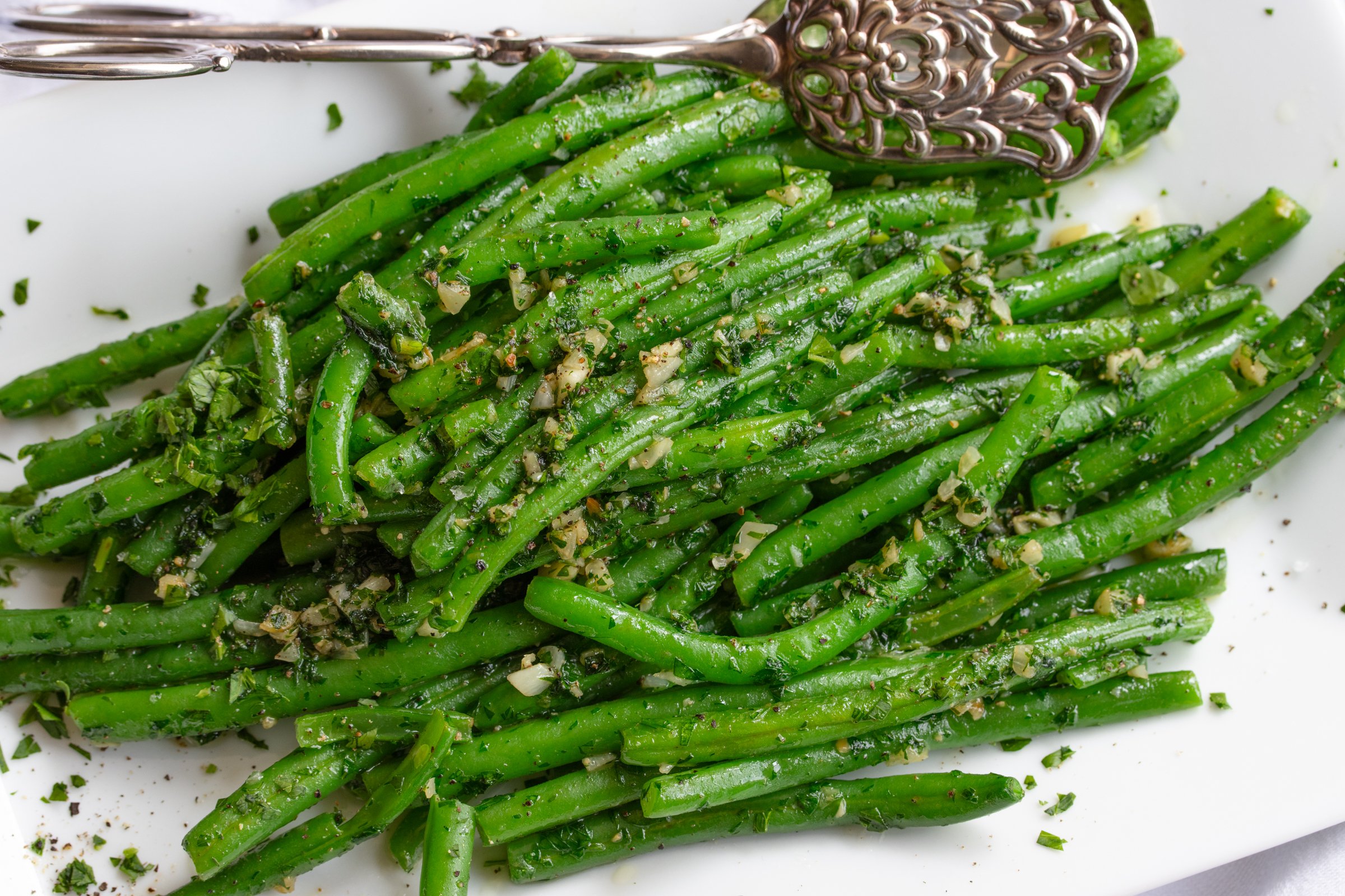 pan fried green beans on a serving plate