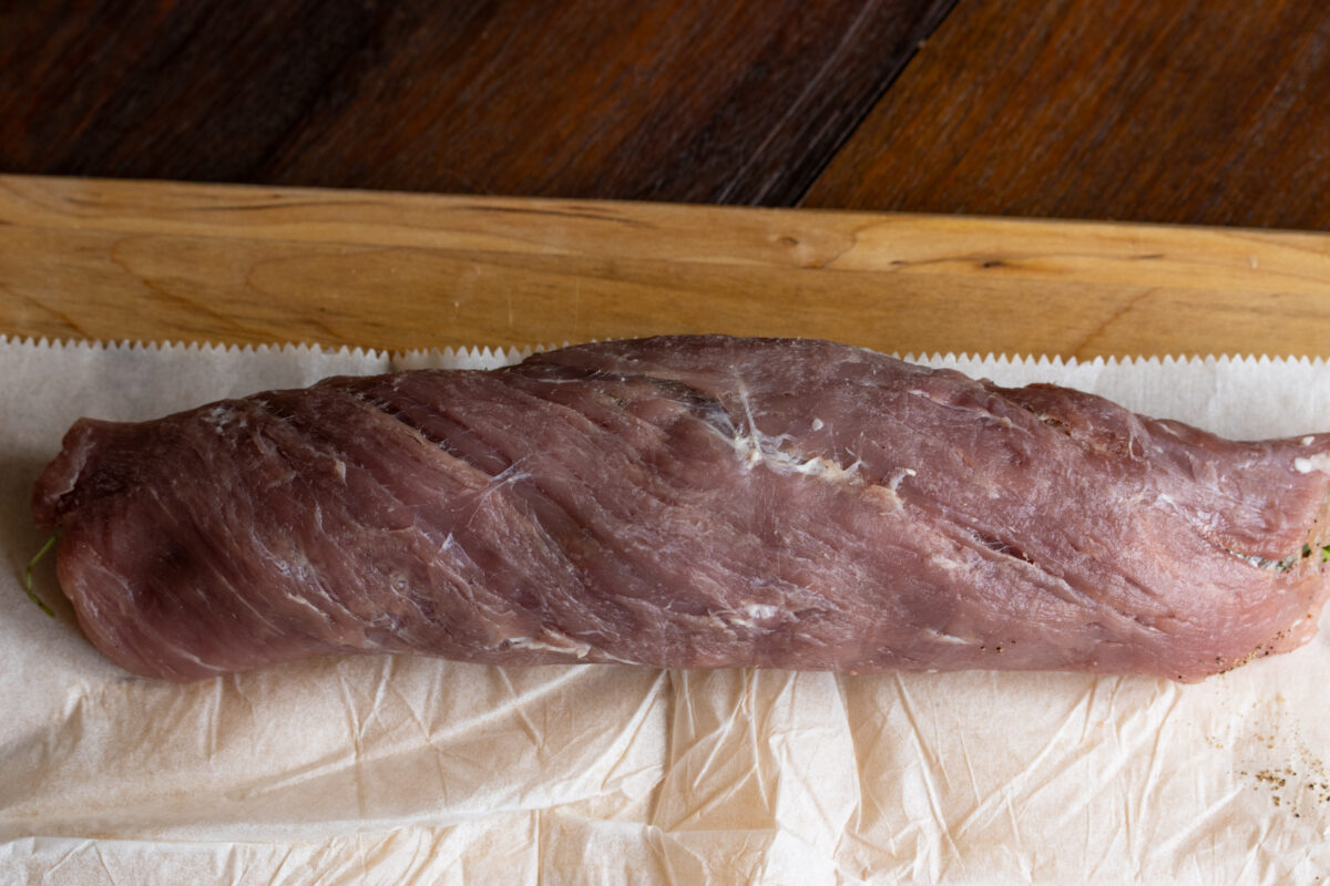 Rolled pork tenderloin with all the arugula and mozzarella tucked inside.