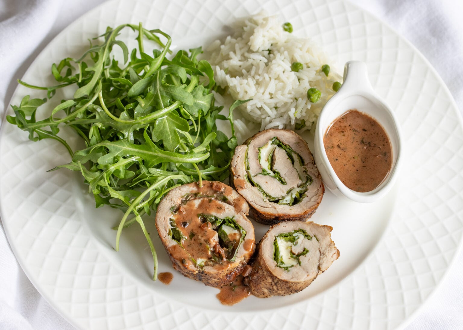 plated stuffed pork tenderloin