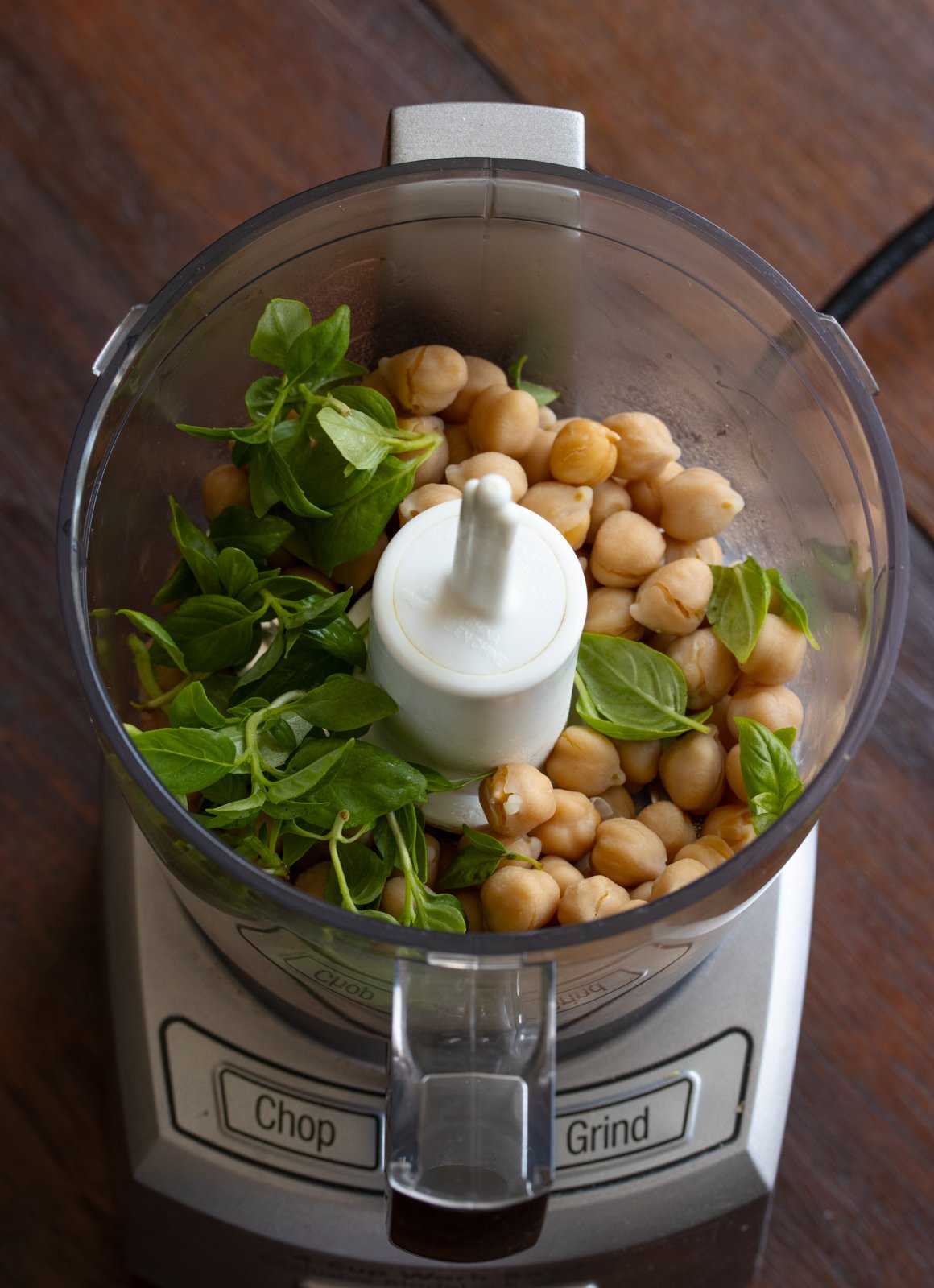 chickpeas and basil in food processor