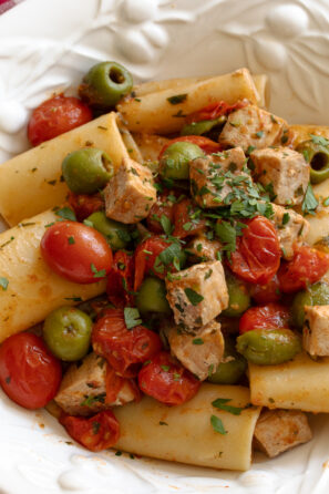paccheri with fresh tuna served in a white plate