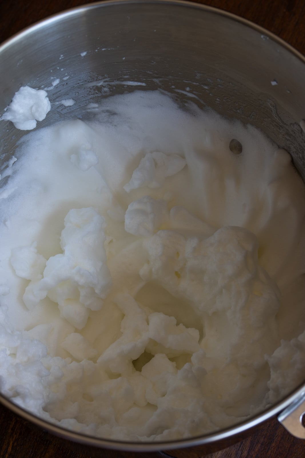 Egg whited beaten until hard tips are formed.