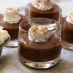 Easy chocolate mousse in a glass topped with whipped cream
