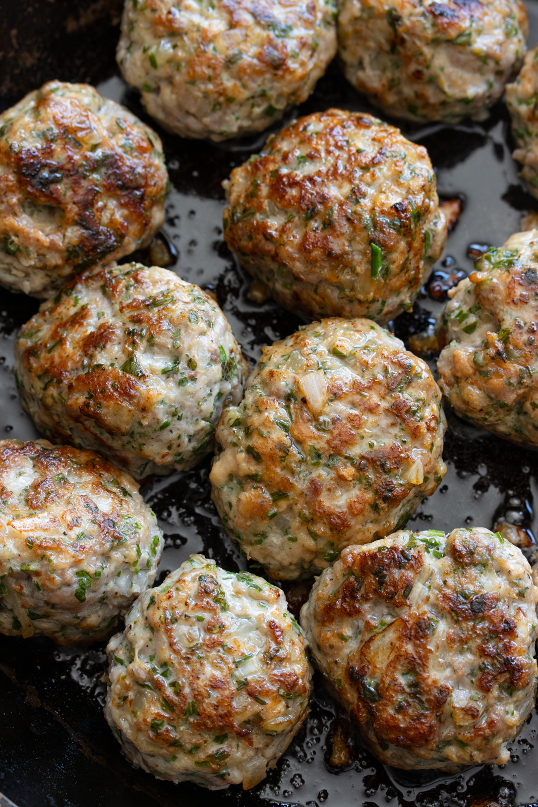 Cooked ground chicken meatballs ready to be enjoyed.