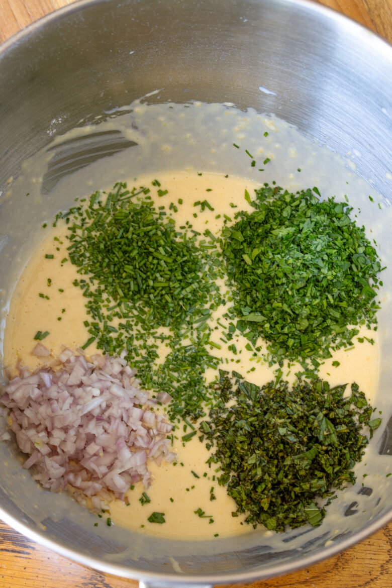 Finely chopped herbs added to the milk flour mixture.
