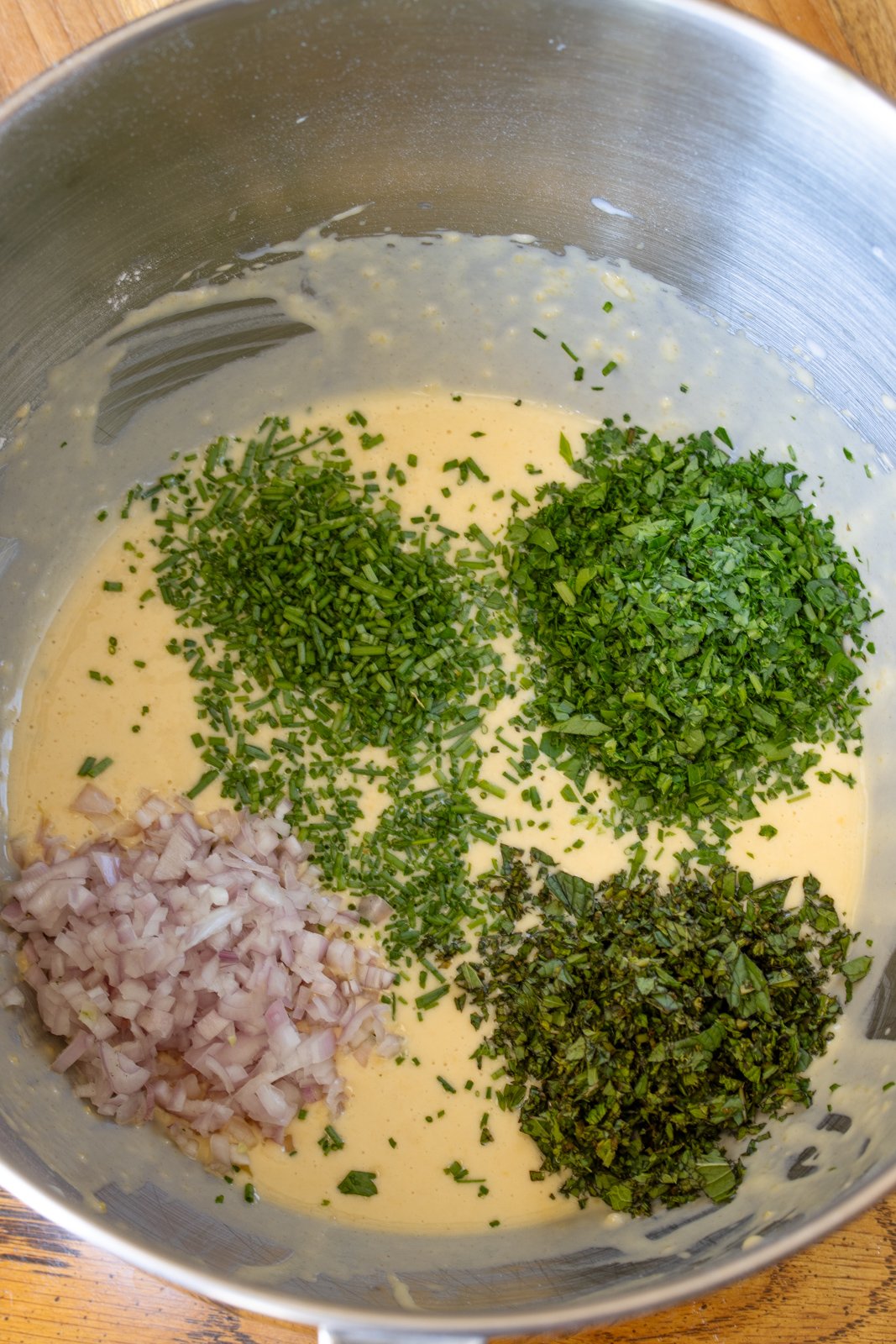 Finely chopped herbs added to the milk flour mixture. 