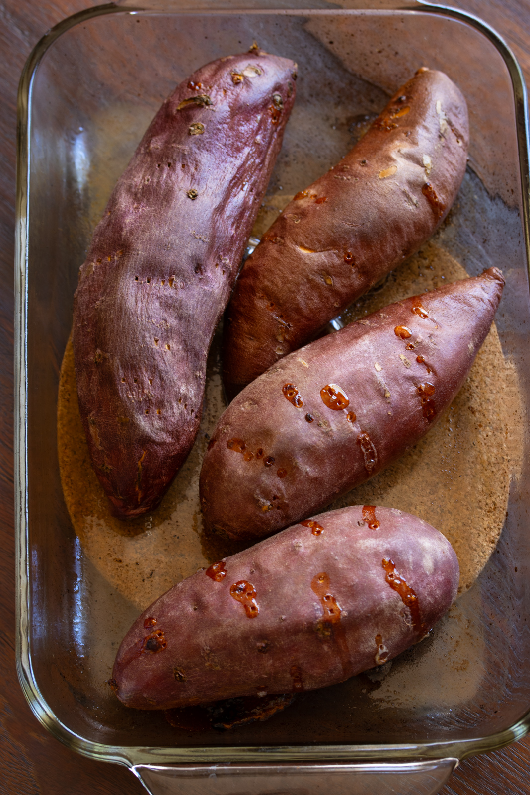 Roasted sweet potatoes cooked and ready to be peeled. 