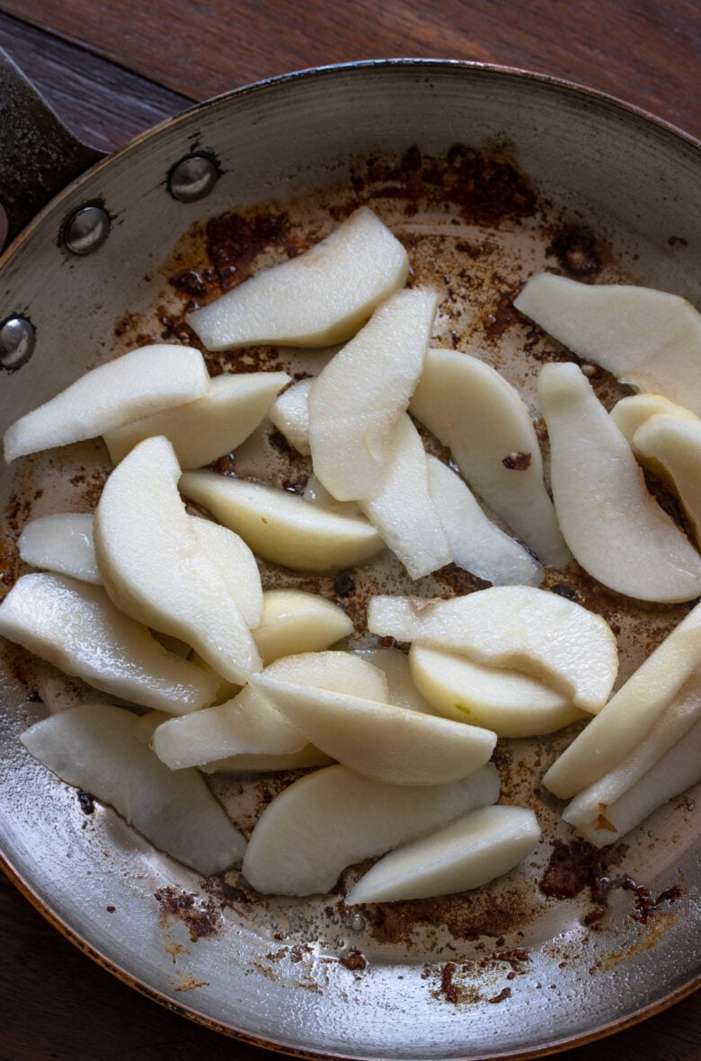 Peas slices added to the skillet where the pork loin chops were cooked in.