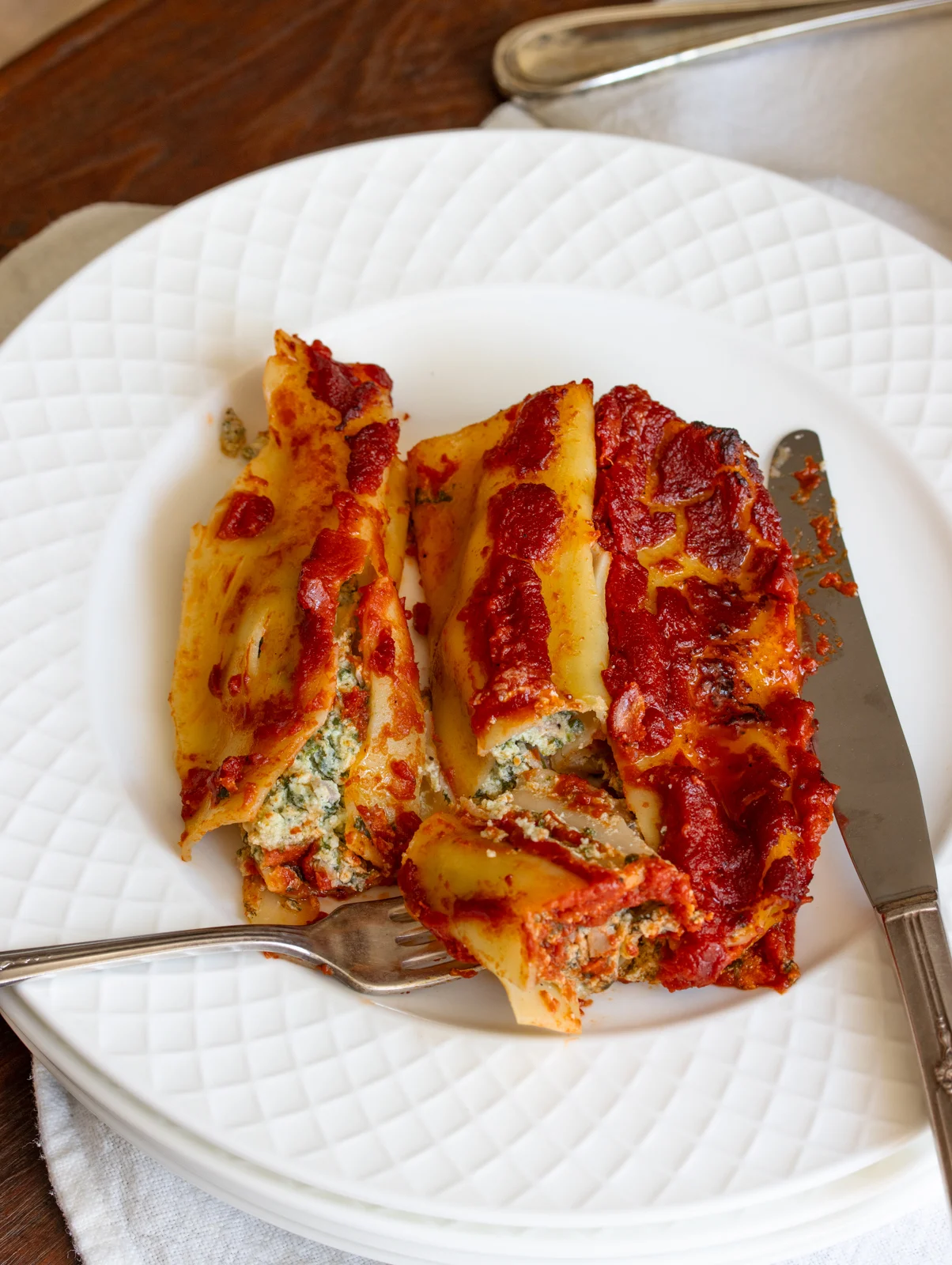 Cannellonin on a white plate ready to be enjoyed.