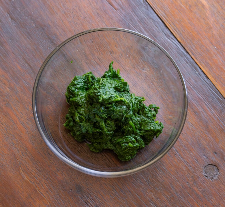 Cooked fresh spinach squeezed. 