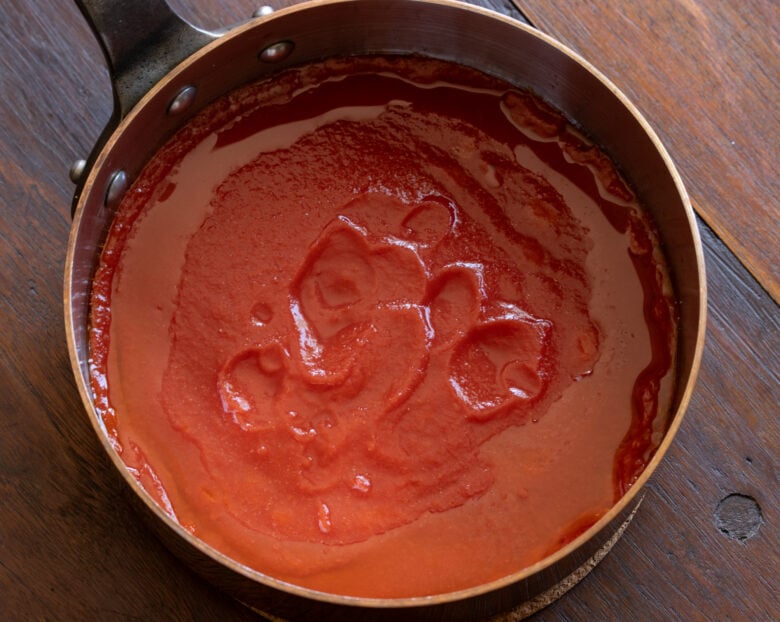 Tomato sauce added to the oil after the garlic was discarded. 
