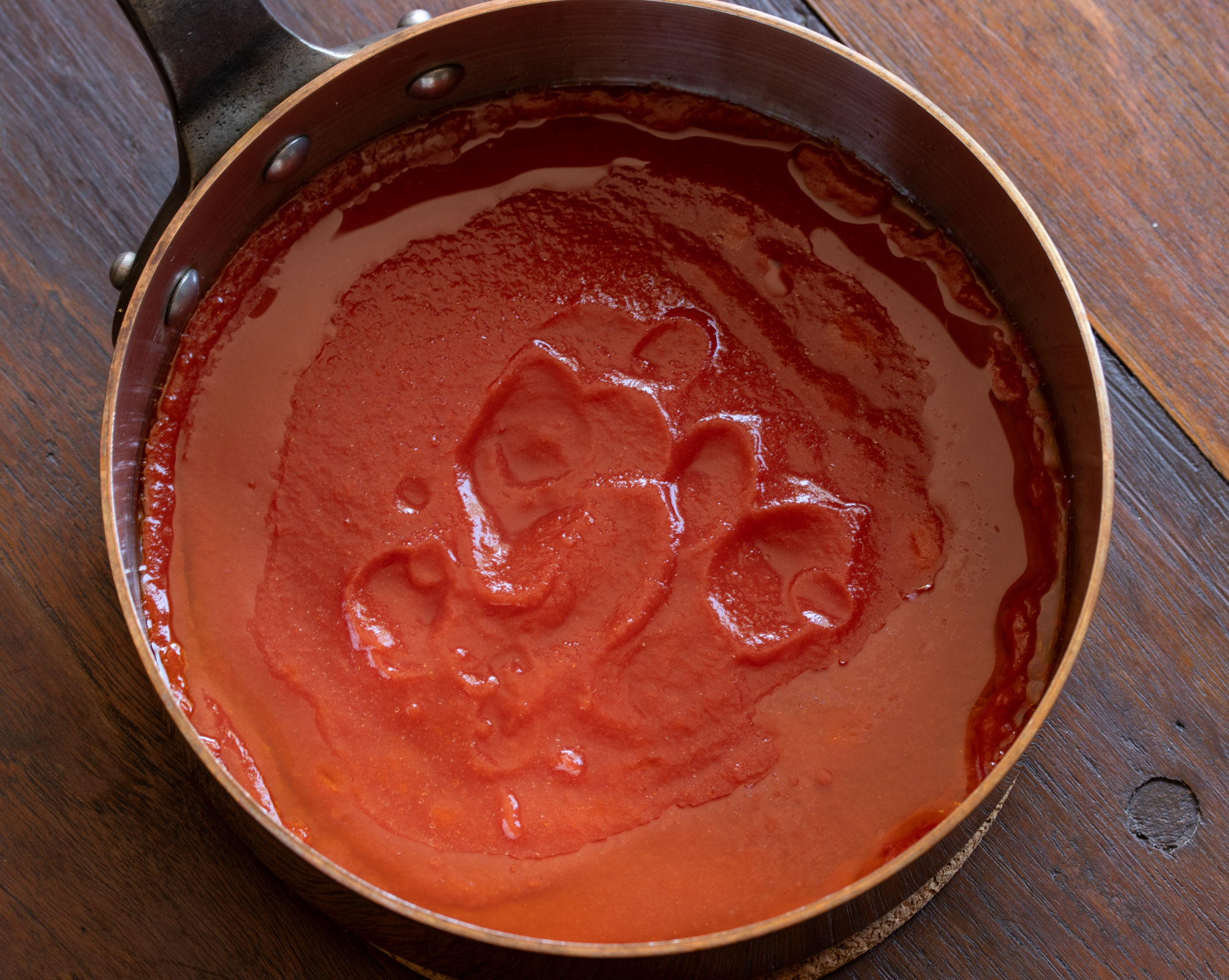 Tomato sauce added to the oil after the garlic was discarded.