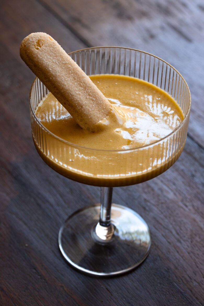 Savoiardi cookie placed in teh zabaglione. 