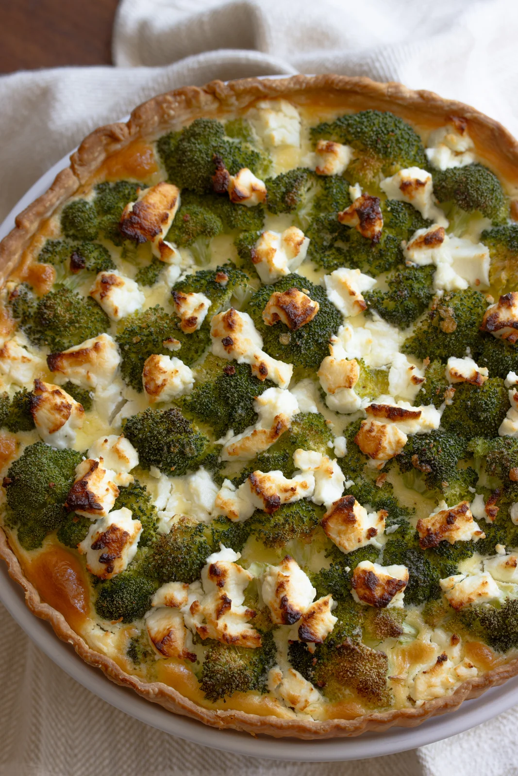 Broccoli quiche on a table.