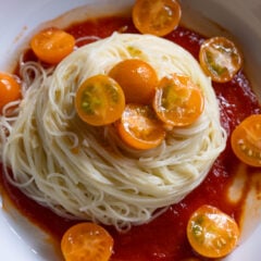 Cherry tomatoes angel hair pasta.