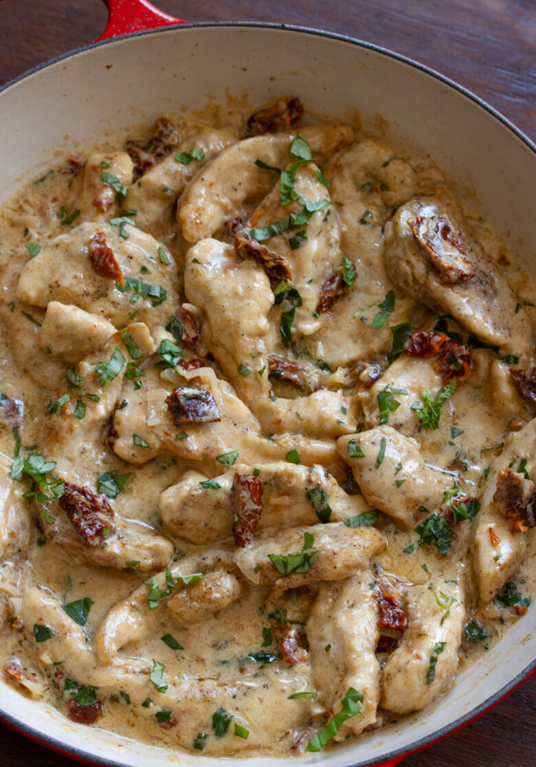 Chicken added back to the skillet with the cream and sun dried tomato. 