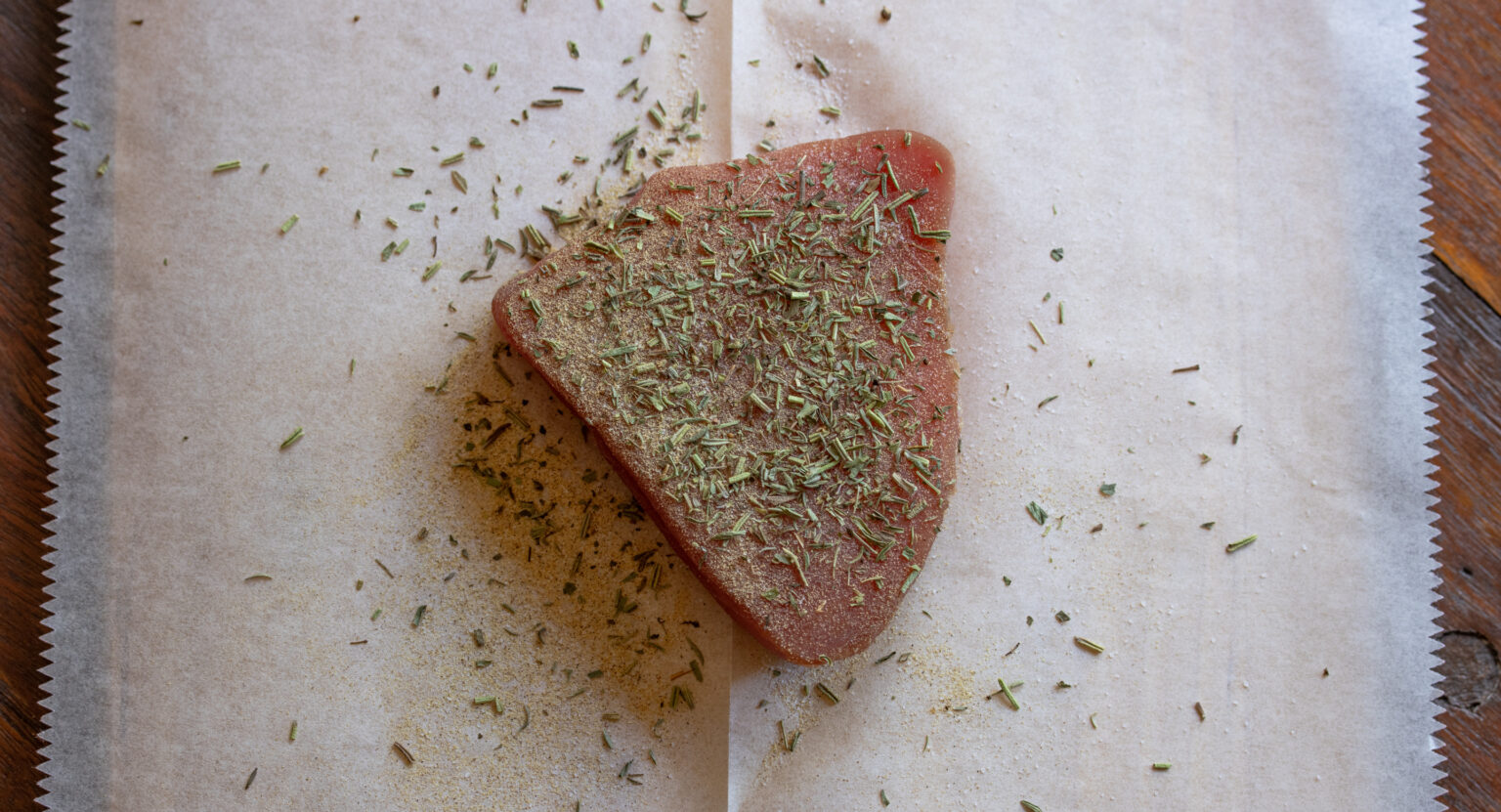 Generously seasoned tuna steak with salt, white pepper and herbes de Provence.