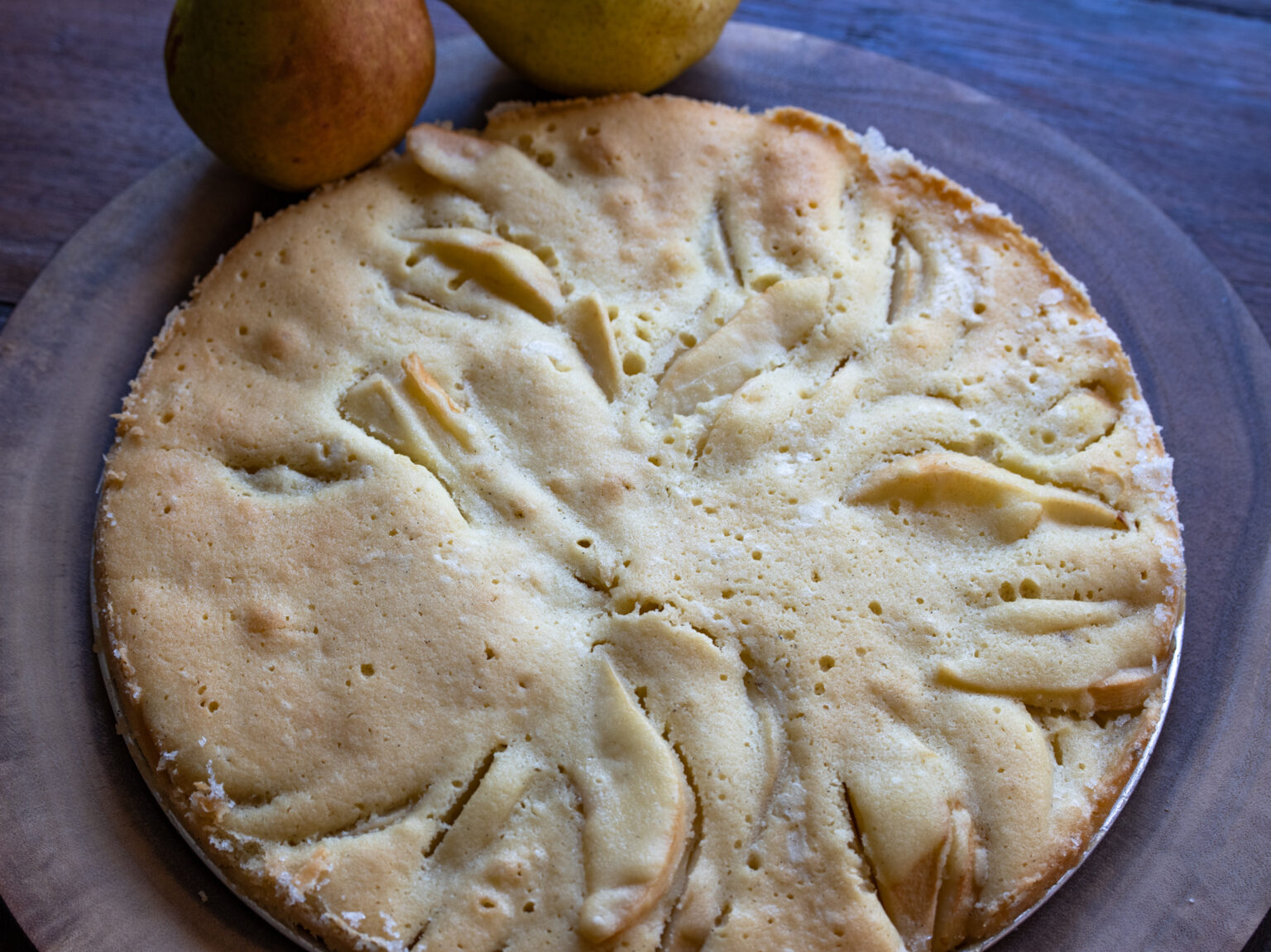 Baked cake out of the oven with a light golden color.