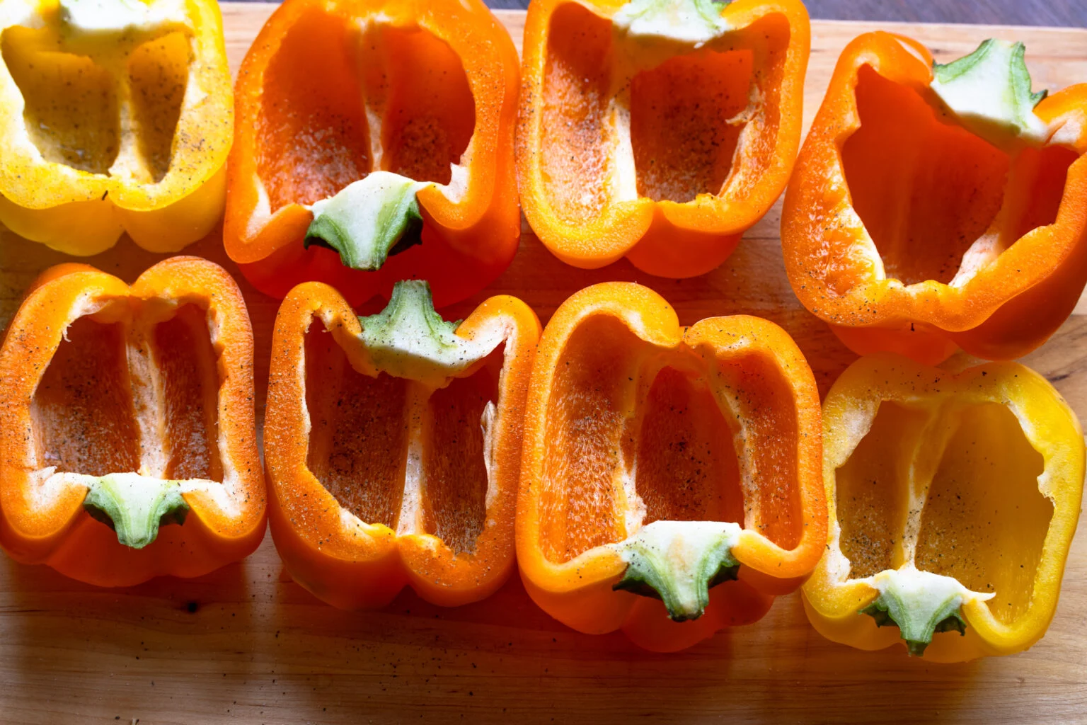Cleaned bell peppers and seasoned with salt and pepper.
