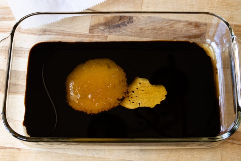 Marinade for the London broil steak in a glass baking pan.