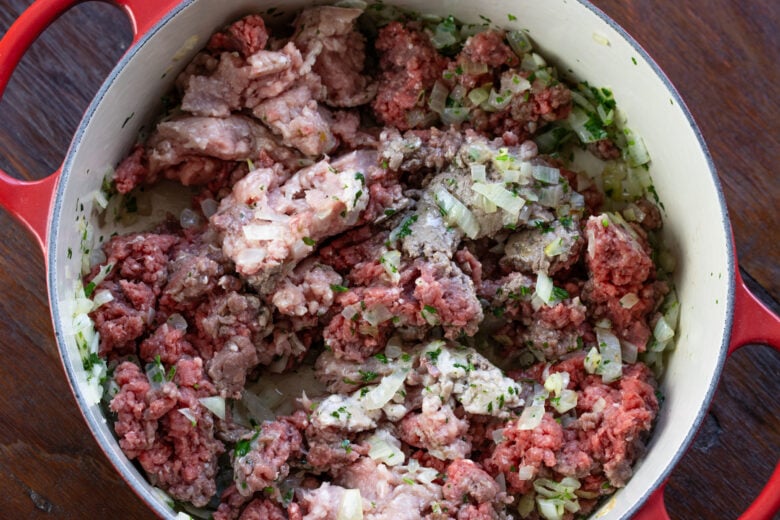 Meat added to the cooked onions. 