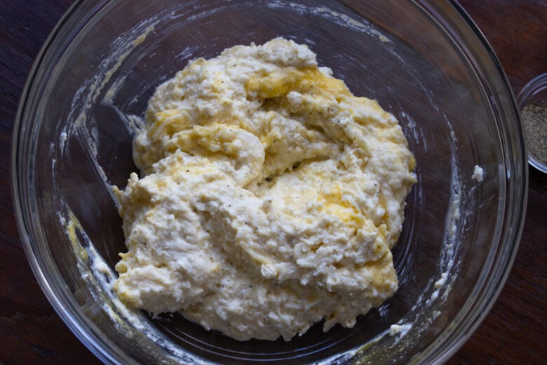 Cheese mixture assembled in a clear bowl.