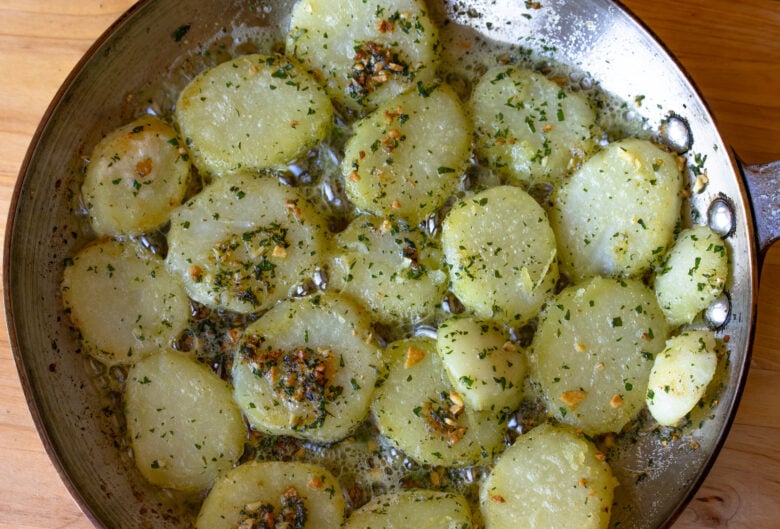 Garlic butter potatoes cooked in the skillet and ready to be enjoyed. 