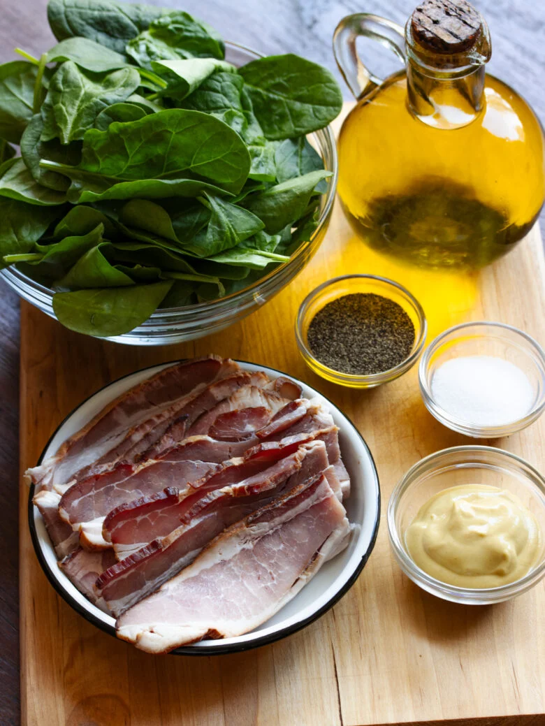 Ingredients needed to make this spinach salad with bacin.