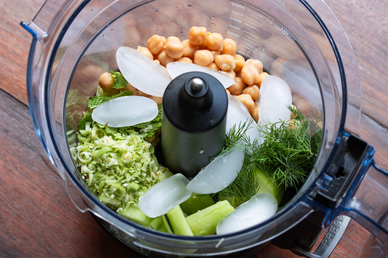 All needed ingredients placed in a food processor to be emulsified. 
