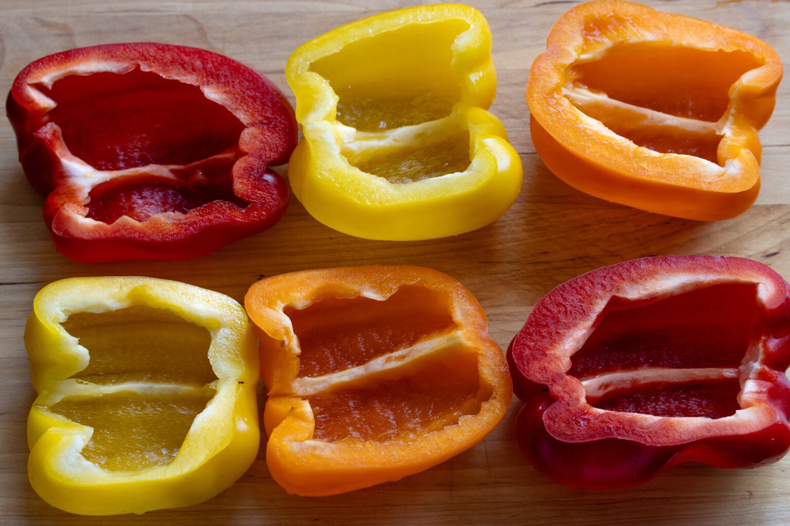 Cleaned bell peppers cut lengthwise. 