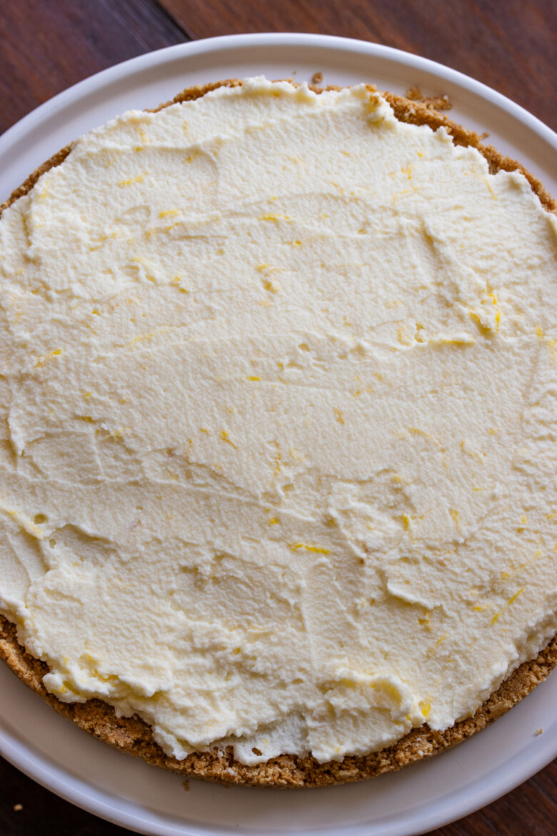 Whipped cream with mascarpone spread over the graham cracker base. 