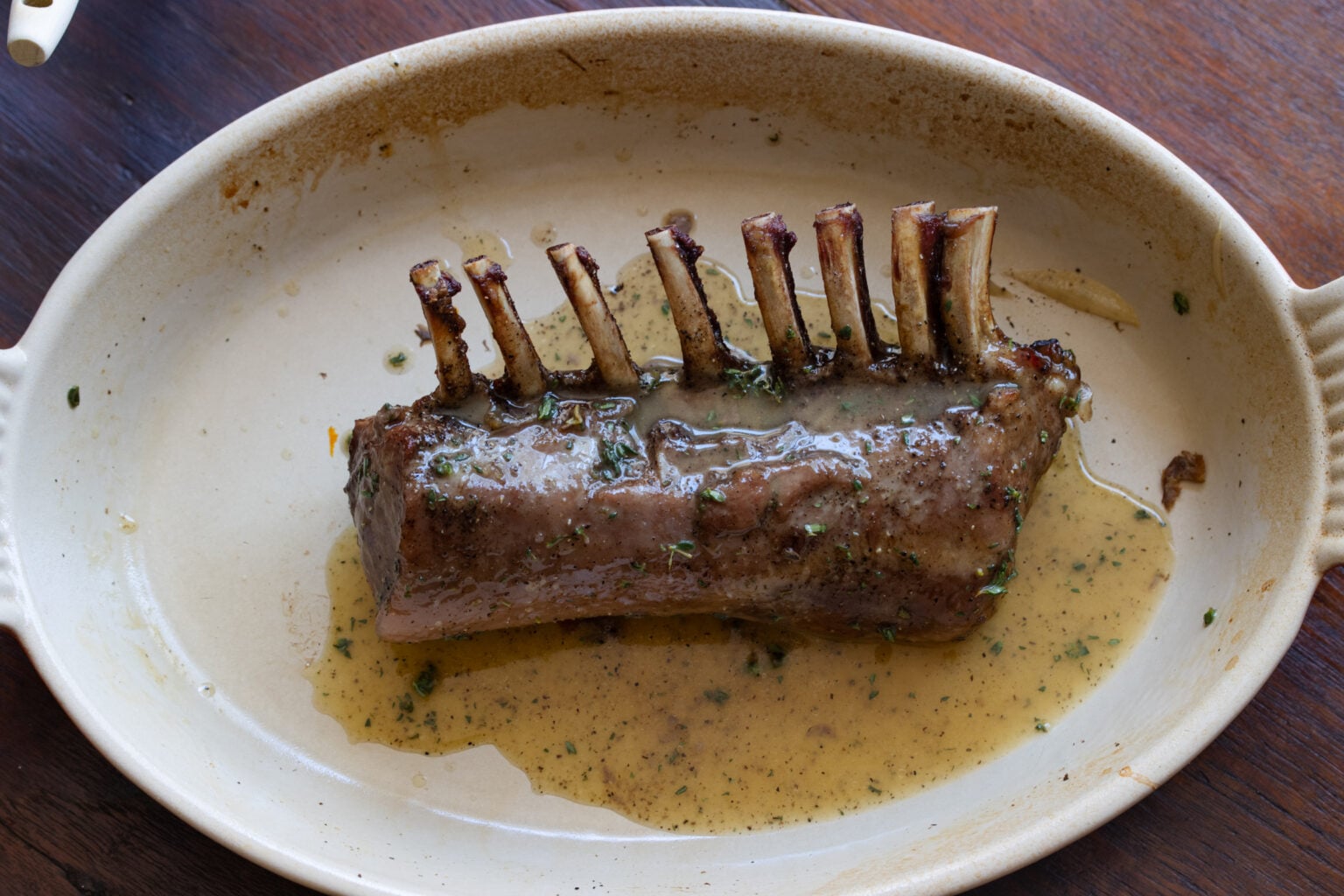 Lamb rack with marinade to create a caramelized sauce.