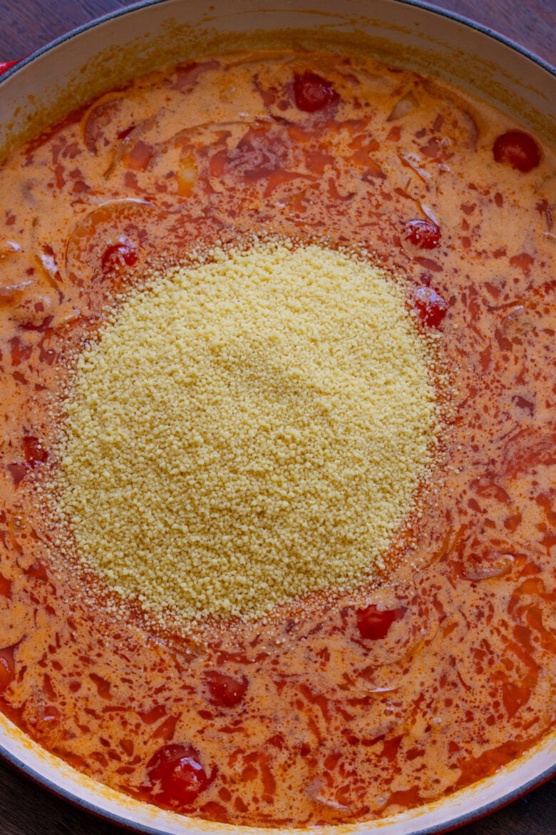 Couscous added to the coconut milk mixture. 
