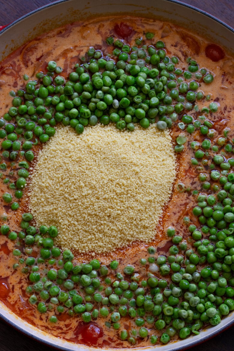 Peas added to the couscous and coconut milk.