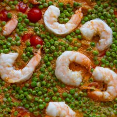 Shrimp and coconut curry with couscous in a skillet.