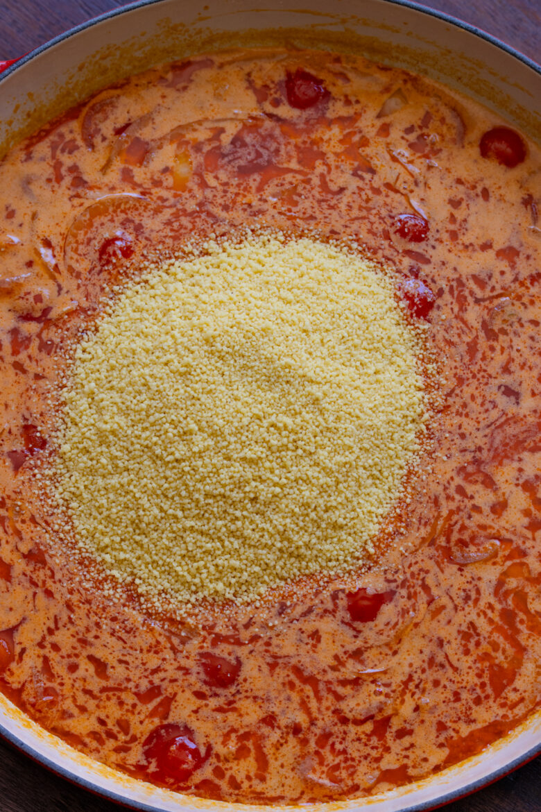 Couscous added to the coconut milk mixture.