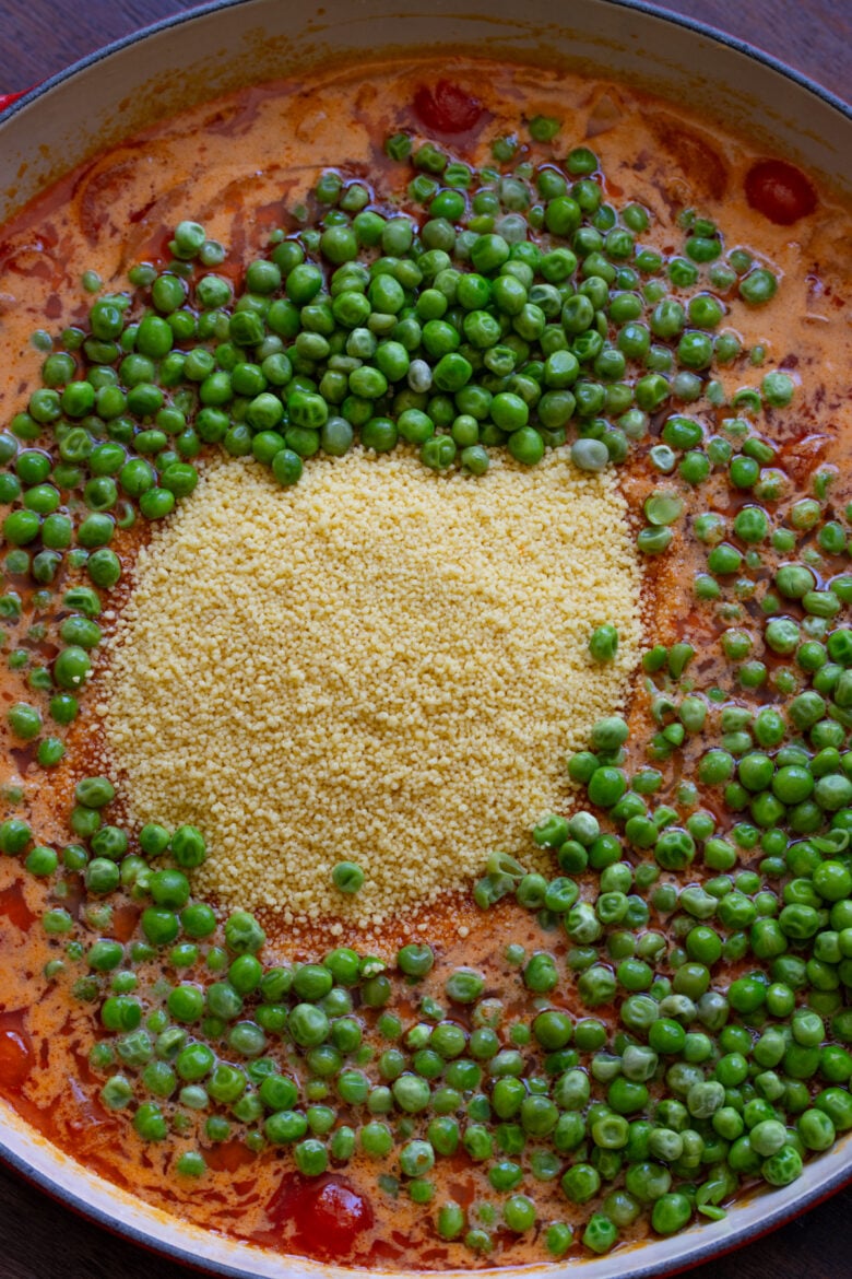 Peas added to the couscous and coconut milk.