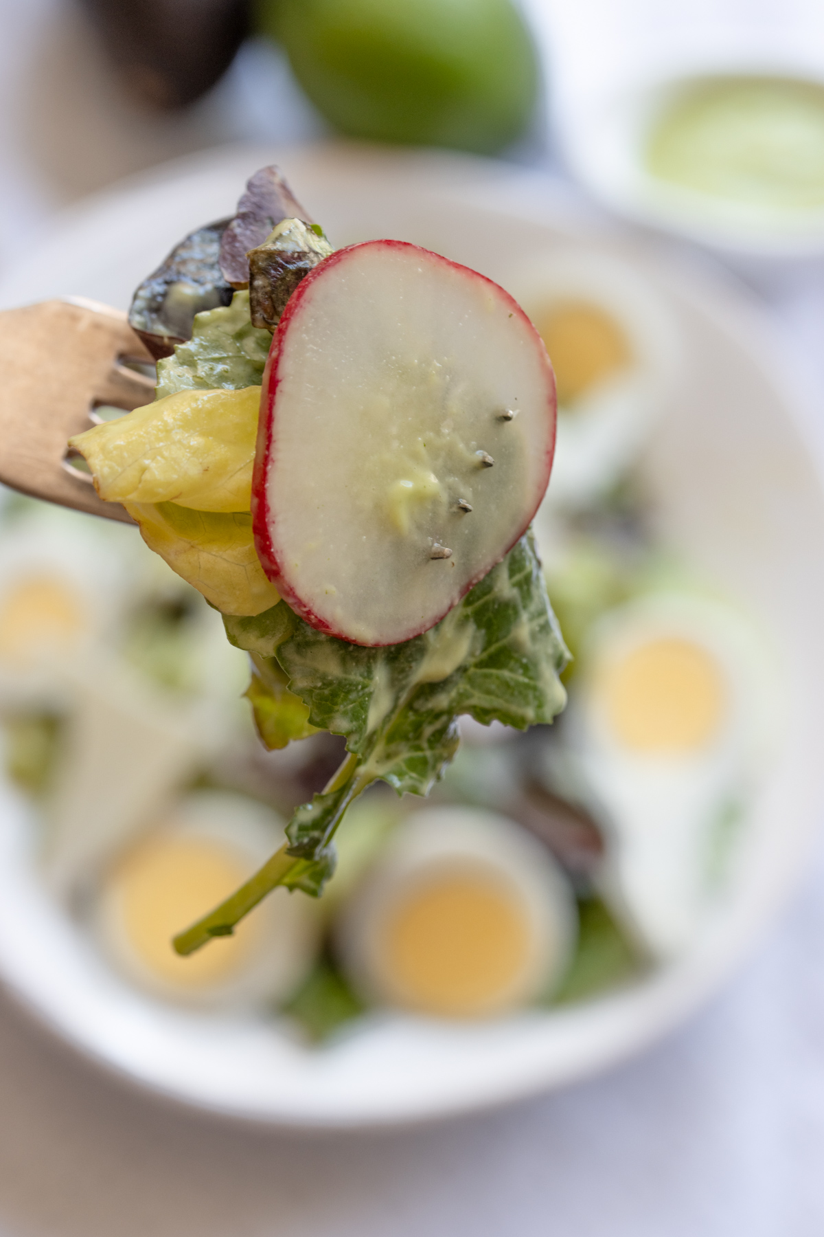 A close up of the avocado lime dressing.
