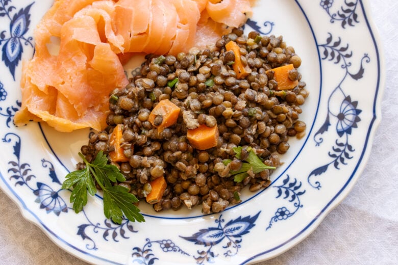 Lentil salad served with smoked salmon.